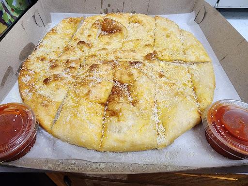 Stone Age Pizza Menu image 9